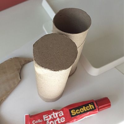 Washi Tape DIY Storage Toilet Paper Rolls. Step 1 : glue bottom on rolls